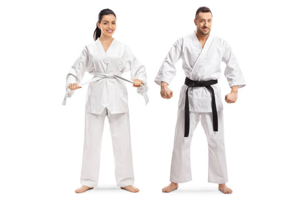 woman with white belt in karate and man with black belt - extreme sports karate sport exercising imagens e fotografias de stock