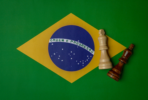 Brazil Flag with king chess pieces.