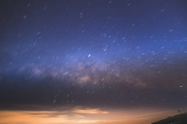 Starry night over the mountain with milky way sky at Thailand