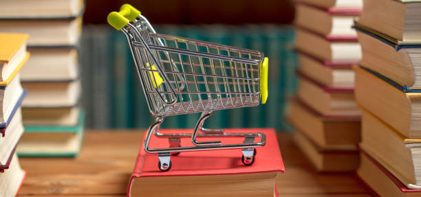 istock Books and a shopping cart 1201368127
