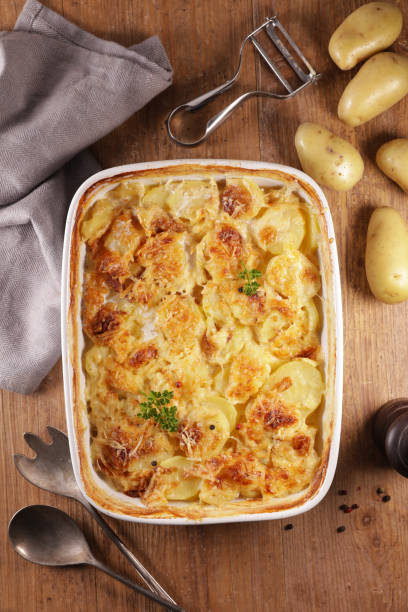 istock potato gratin with cream and cheese 1201377436
