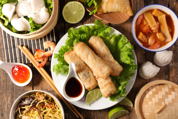 istock assorted of asian food- spring roll, noodles soup, dim sum 1201383229