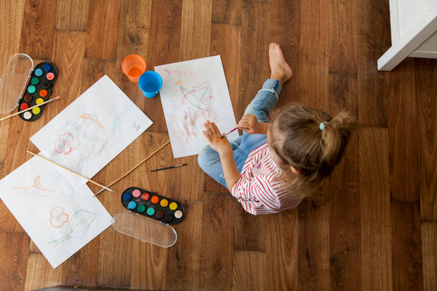 2,000+ Kids Coloring On Floor Stock Photos, Pictures & Royalty-Free ...