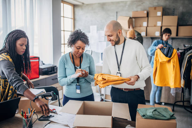 istock Diverse group of people arranging customers orders for drop shipping 1201395295