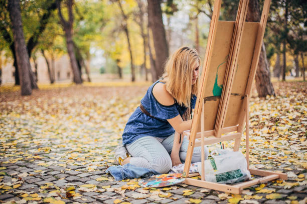istock Beautiful artist painting 1201396333