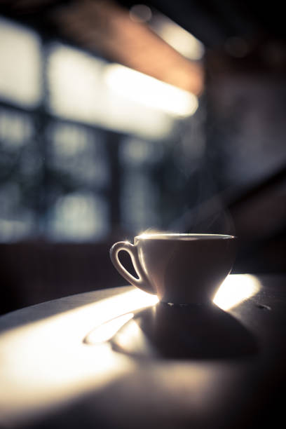istock Steamy coffee cup in the sunlight 1201397907