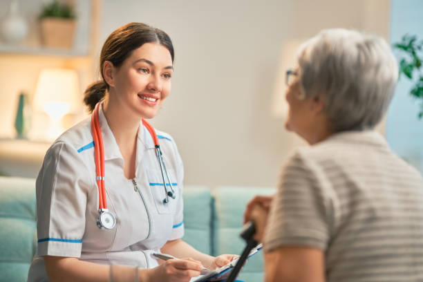 istock Happy patient and caregiver 1201399274