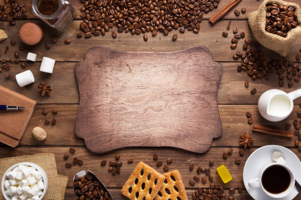 istock cup of coffee and beans on wooden background table 1201399402