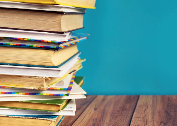 istock A stack of old books with yellow pages. Book binding. Knowledge and education. 1201399753