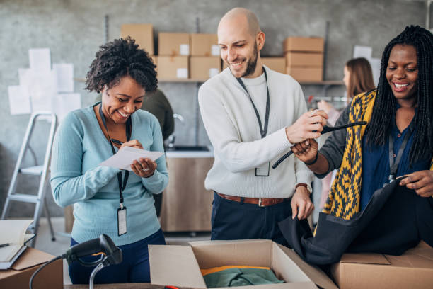 istock Diverse group of people arranging customers orders for drop shipping 1201401599