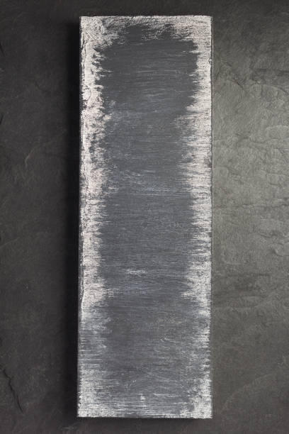 istock black wooden plank board background as texture 1201404143