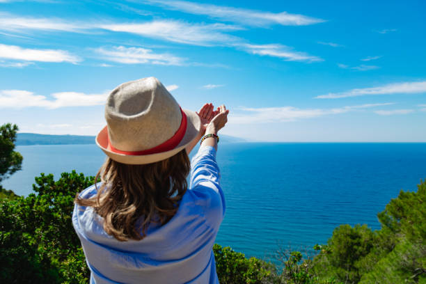 istock Woman enjoying nice tropical summertime days. 1201404560