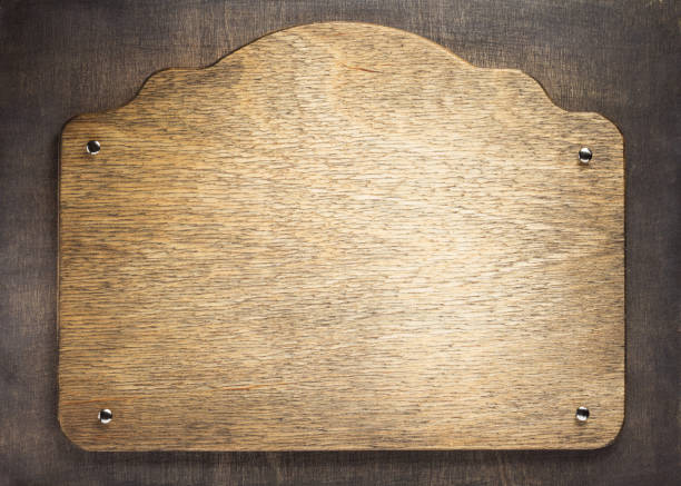 istock nameplate at wooden background texture at plank board wall 1201404640