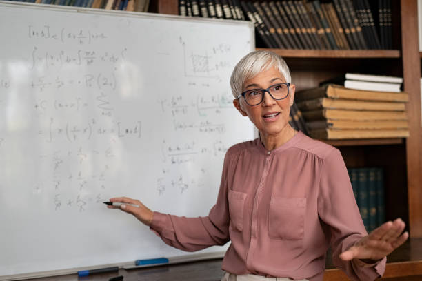 Old Math Professor 7,000+ Older Woman College Student Stock Photos, Pictures & Royalty ...