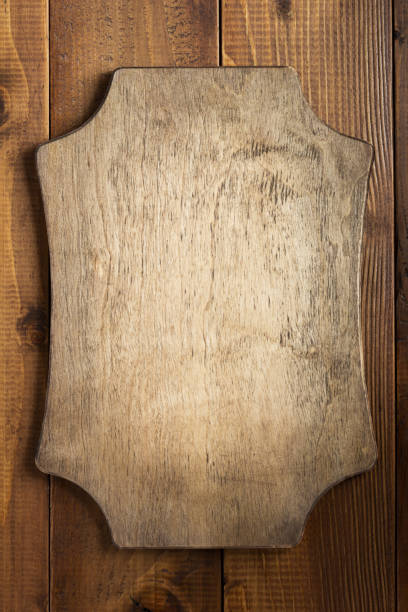 nameplate at wooden background texture, on plank board wall
