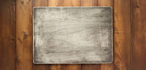 istock nameplate at wooden background texture at plank board wall 1201405451