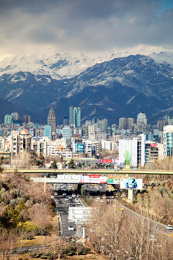 Tehran with mountain in background