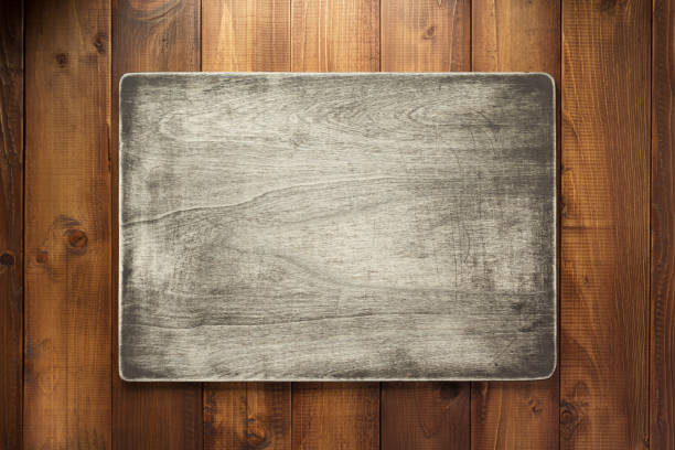istock nameplate at wooden background texture 1201406221