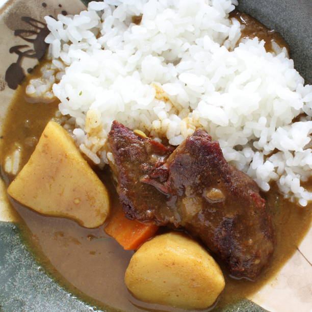 istock Japanese curry rice, potato and beef 1201407241