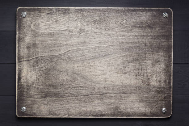 istock nameplate at wooden background texture 1201407244