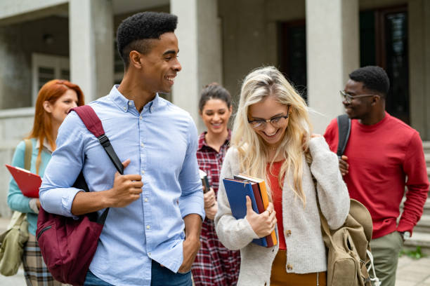 istock College friends student in conversation outdoor 1201407369