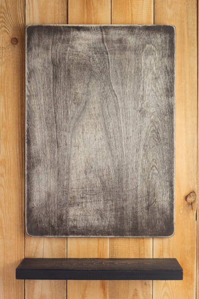 istock nameplate at wooden background texture, on plank board 1201408739
