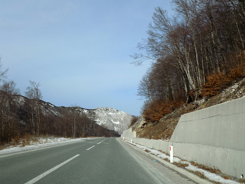Road trip through a snowy mountain