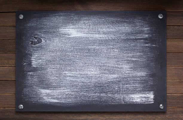 istock nameplate at wooden background texture, on plank board 1201409374