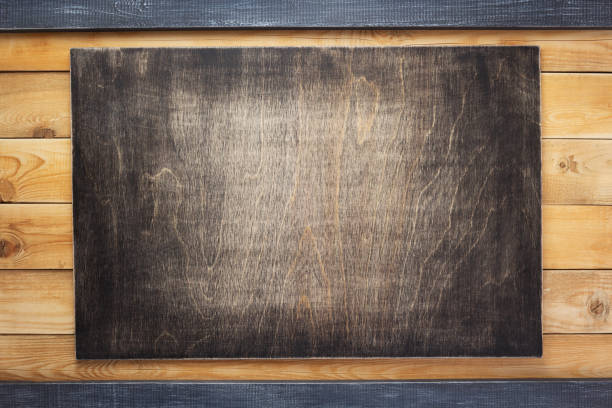 istock nameplate at wooden background texture, on plank board 1201409440