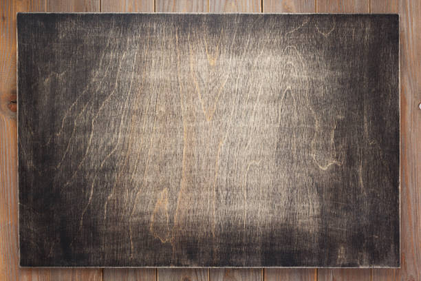 istock nameplate at wooden background texture, on plank board 1201409588