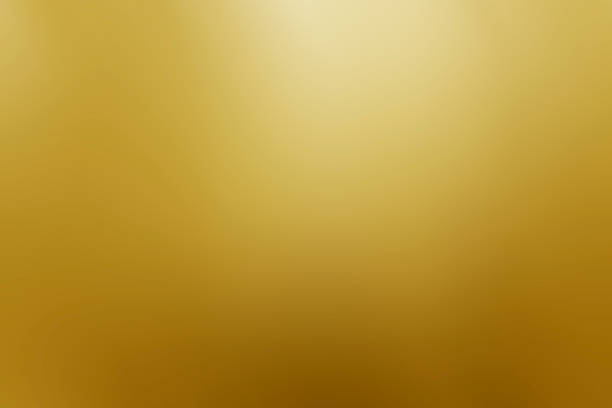 istock gold blurred gradient background. Abstract smooth colorful illustration 1201410569