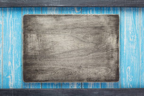 istock nameplate at wooden background texture, on plank board 1201410622