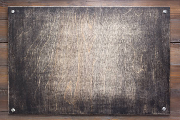 istock nameplate at wooden background texture, on plank board 1201410812