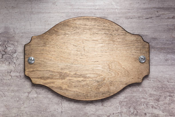 istock nameplate at wooden background texture, on plank board 1201411172