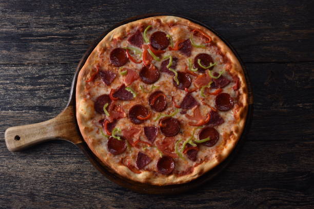 istock pizza dough and tomato next to the guilty pizza 1201414216