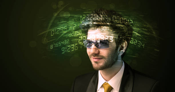 istock Business man looking at high tech number calculations 1201416205