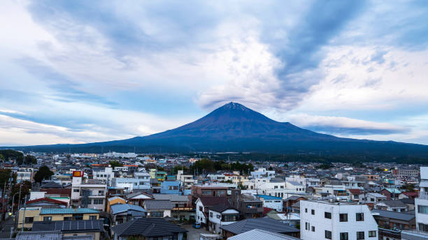 istock Fuji Mountain with cityscape over blue sky 1201419811