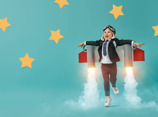 istock child in an astronaut costume 1201420167