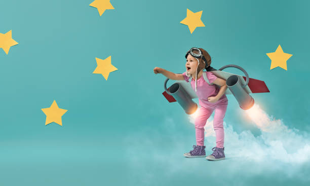 istock child in an astronaut costume 1201420181
