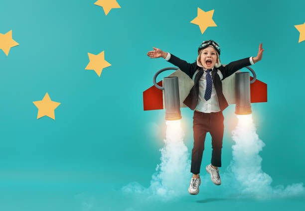 istock child in an astronaut costume 1201420183