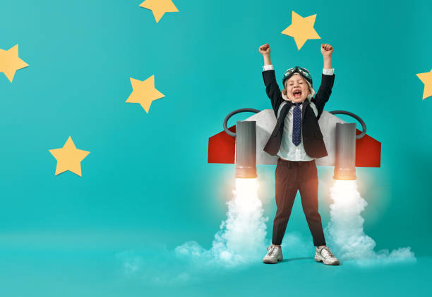 istock child in an astronaut costume 1201420184