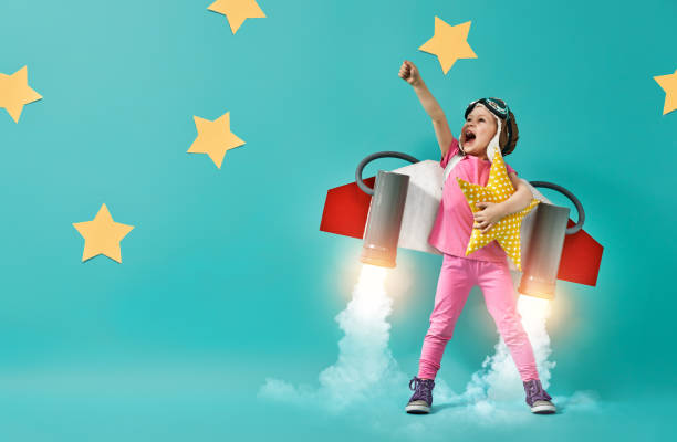 istock child in an astronaut costume 1201420194