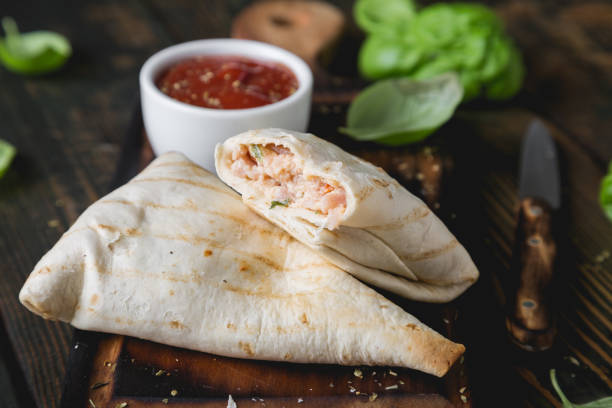 istock Tortilla wrapped meat and cheese sandwich 1201422332