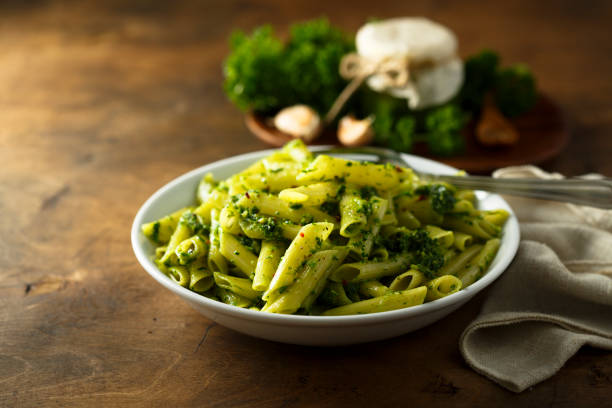 istock Pasta with pesto sauce 1201422344