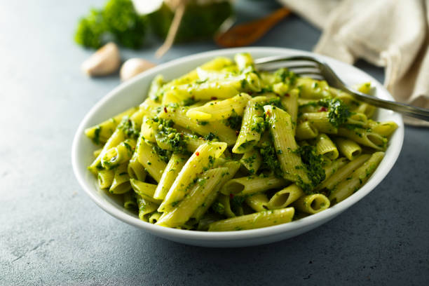 istock Pasta with pesto sauce 1201422526