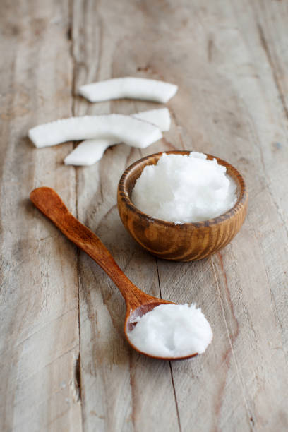 istock Coconut oil in a bowl with a spoon 1201426142