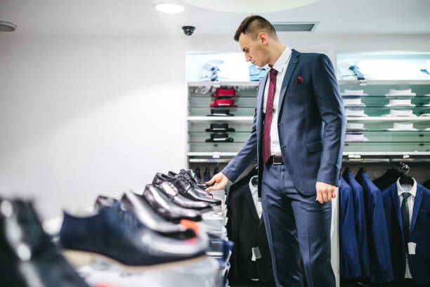 istock Man buying shoes 1201427053