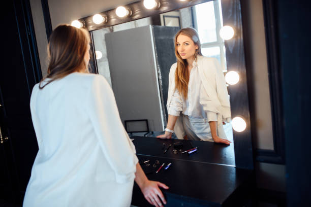 istock Girl in the dressing room. 1201428060