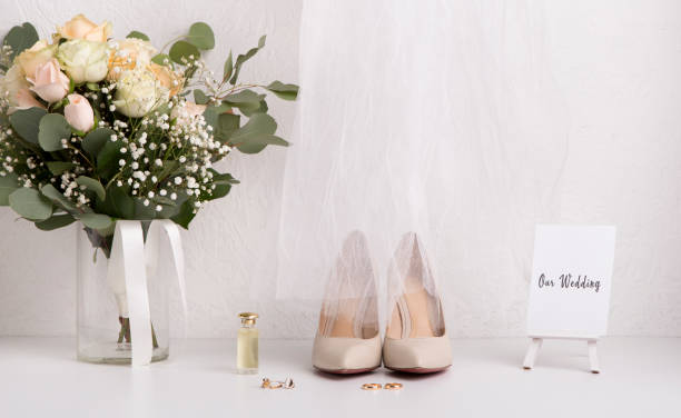 istock Bride accessories with bouquet and high heel shoes 1201429380