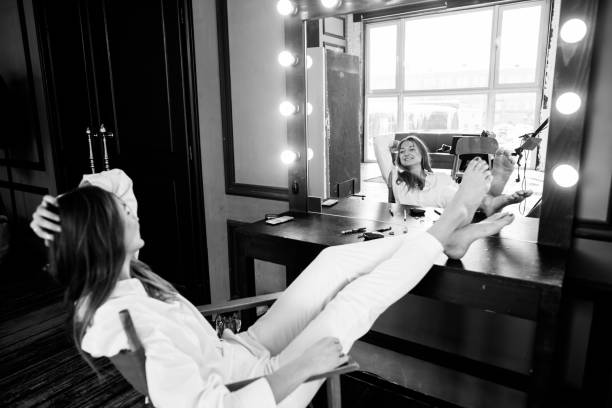 istock Girl in the dressing room. 1201429396